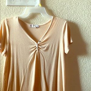I am selling a gold /yellow top